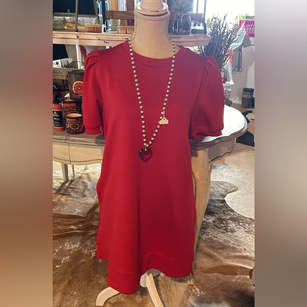 Cute red dress with pockets.